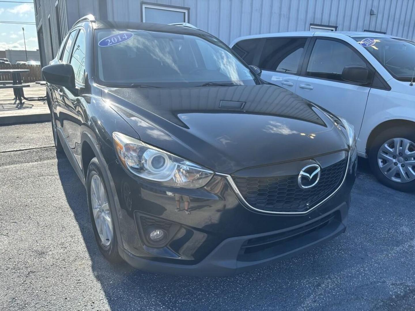 2014 BLACK MAZDA CX-5 TOURING (JM3KE2CY6E0) , located at 100 West Coliseum Boulevard, Fort Wayne, IN, 46805, (260) 471-0567, 41.119961, -85.140312 - Photo#0