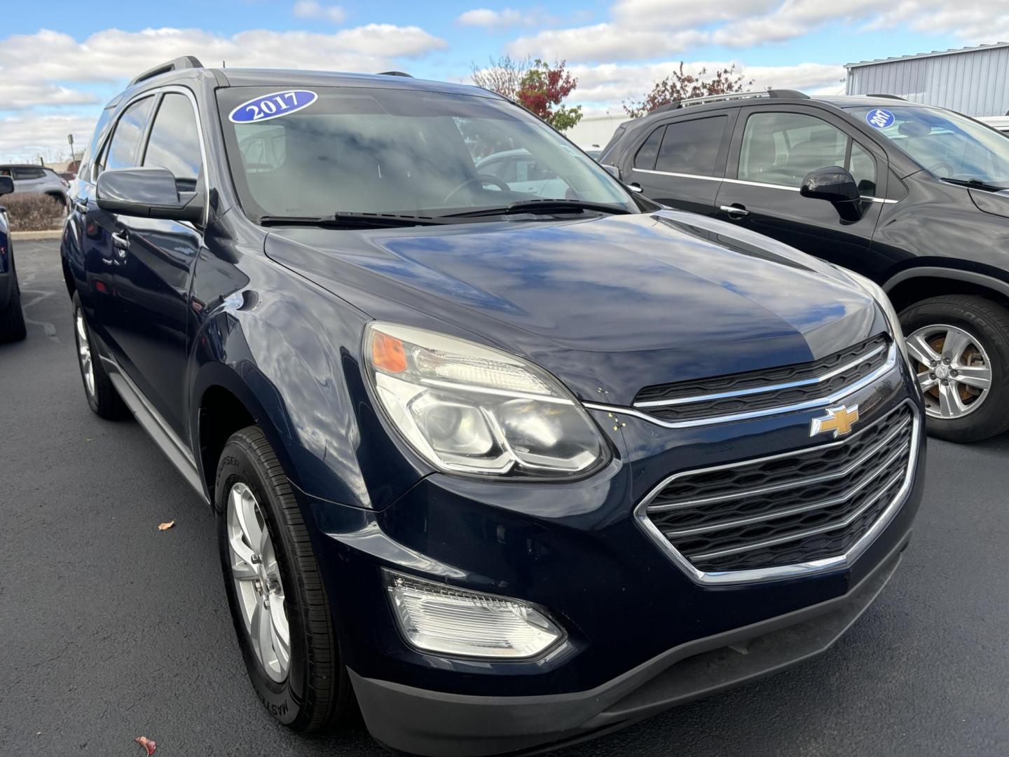 2017 BLUE CHEVROLET EQUINOX LT LT 2WD (2GNALCEK0H6) with an 2.4L L4 DOHC 16V FFV engine, 6A transmission, located at 100 West Coliseum Boulevard, Fort Wayne, IN, 46805, (260) 471-0567, 41.119961, -85.140312 - Photo#0