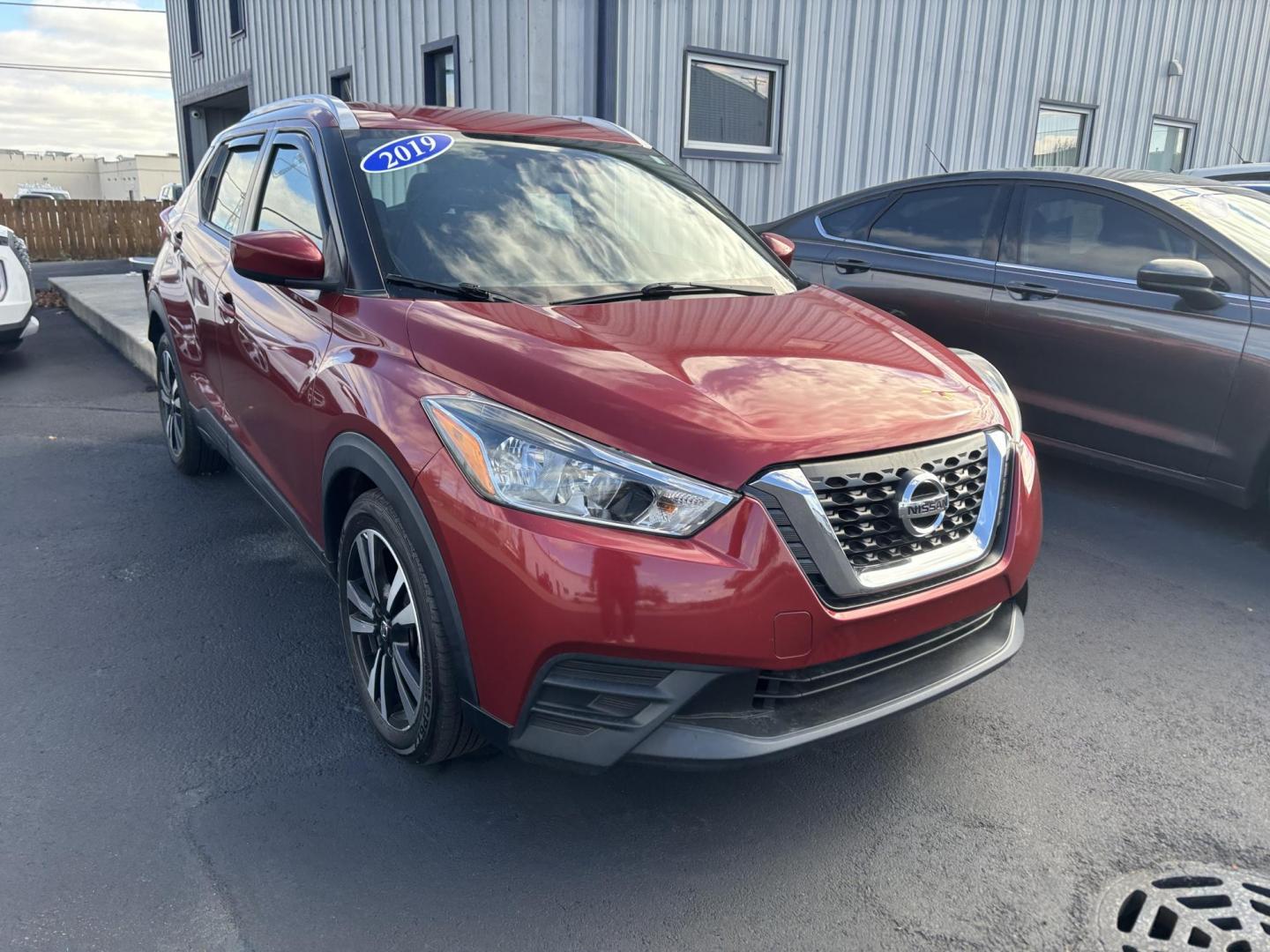 2019 BURGANDY NISSAN KICKS SR; S; SV S (3N1CP5CU4KL) with an 1.6L L4 engine, CVT transmission, located at 100 West Coliseum Boulevard, Fort Wayne, IN, 46805, (260) 471-0567, 41.119961, -85.140312 - Photo#0