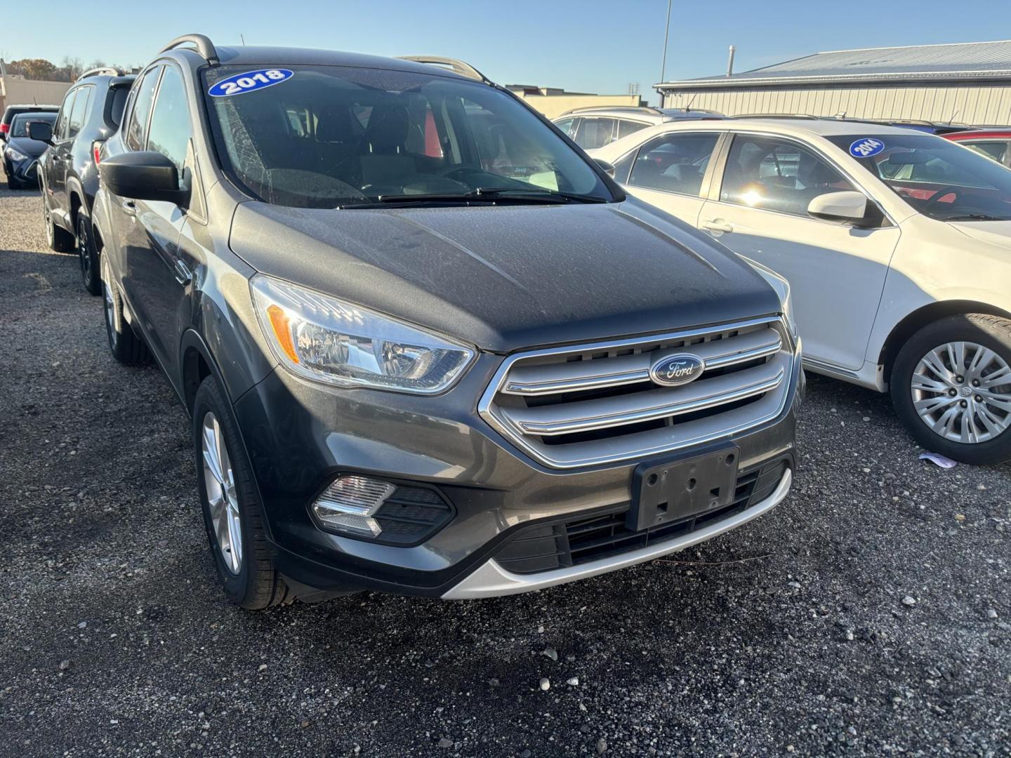 2018 GREY FORD ESCAPE SE (1FMCU9G9XJU) , located at 15 Petro Dr, Warsaw, IN, 46582, (574) 306-0055, 41.273563, -85.857544 - Photo#0