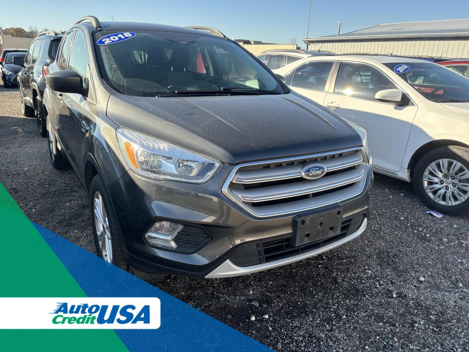 2018 GRAY Ford ESCAPE SE (1FMCU9G9XJU) with an Other engine, located at 15 Petro Dr, Warsaw, IN, 46582, (574) 306-0055, 41.273563, -85.857544 - 2018 Ford ESCAPE SE - Photo#0