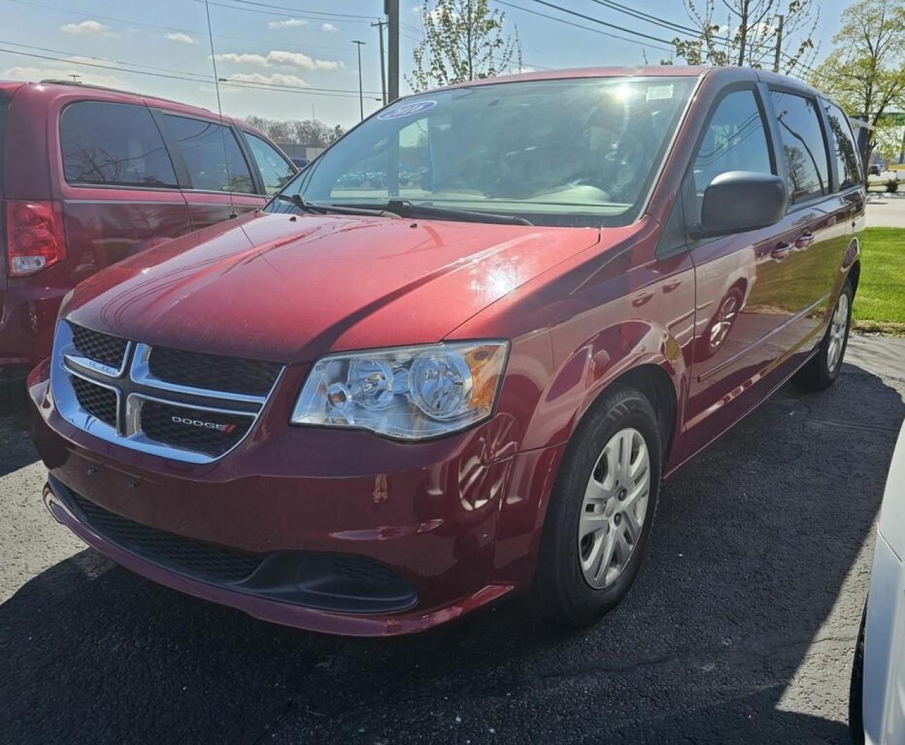 2016 RED DODGE GRAND CARAVAN SE (2C4RDGBG6GR) , located at 5744 Central Avenue, Toledo, OH, 43615, (419) 724-0130, 41.676781, -83.682137 - Photo#1