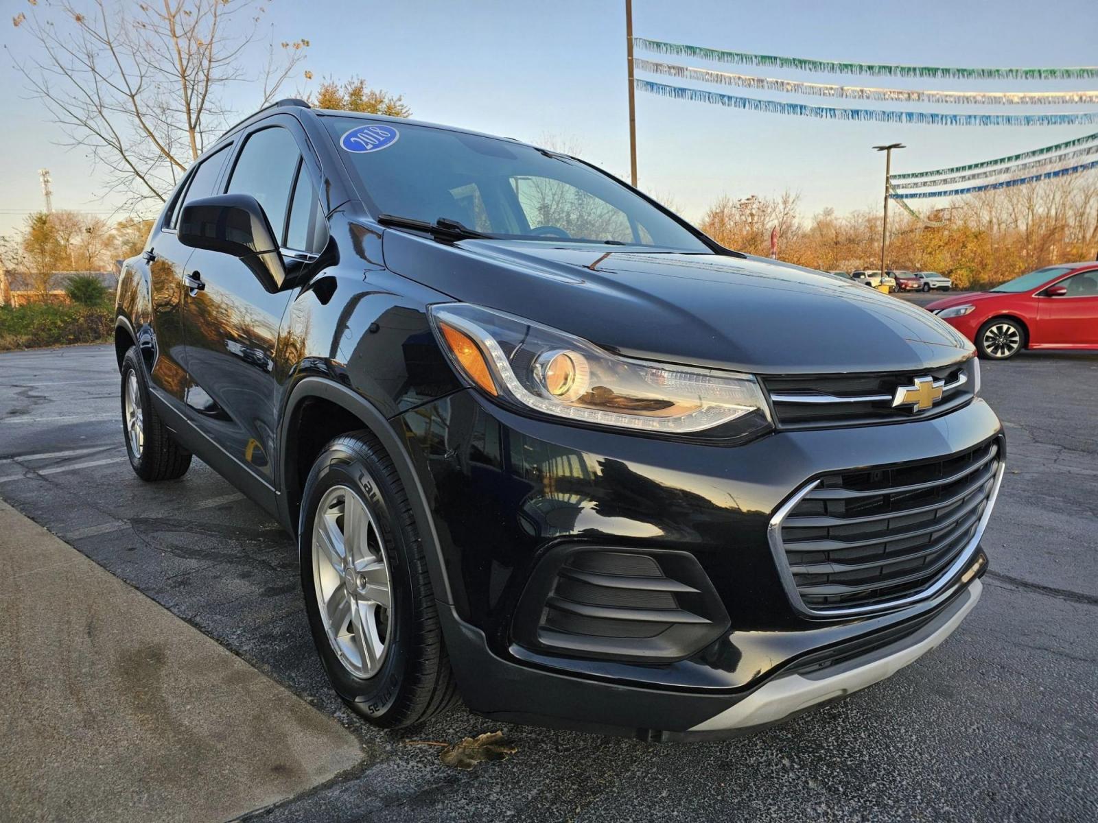 2018 BLACK /BLACK Chevrolet TRAX LT FWD (3GNCJLSB8JL) with an 1.4L L4 DOHC 16V engine, 6A transmission, located at 502 South Main Street, Columbia City, IN, 46725, (260) 244-4645, 41.151382, -85.490578 - 2018 Chevrolet TRAX LT FWD - Photo#2