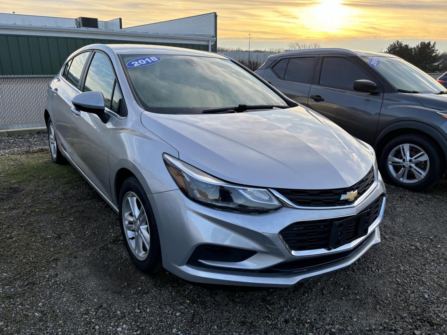 2018 SILVER CHEVROLET CRUZE LT (3G1BE6SM4JS) , located at 15 Petro Dr, Warsaw, IN, 46582, (574) 306-0055, 41.273563, -85.857544 - Photo#0