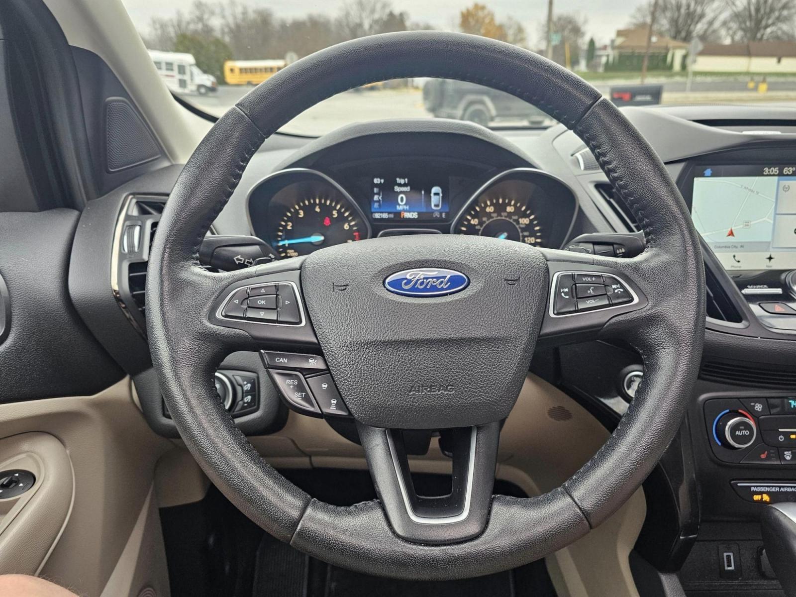 2017 GOLD /Tan Ford ESCAPE TITANIUM Titanium FWD (1FMCU0J90HU) with an 2.0L L4 DOHC 16V engine, 6A transmission, located at 502 South Main Street, Columbia City, IN, 46725, (260) 244-4645, 41.151382, -85.490578 - 2017 Ford ESCAPE TITANIUM Titanium FWD - Photo#8