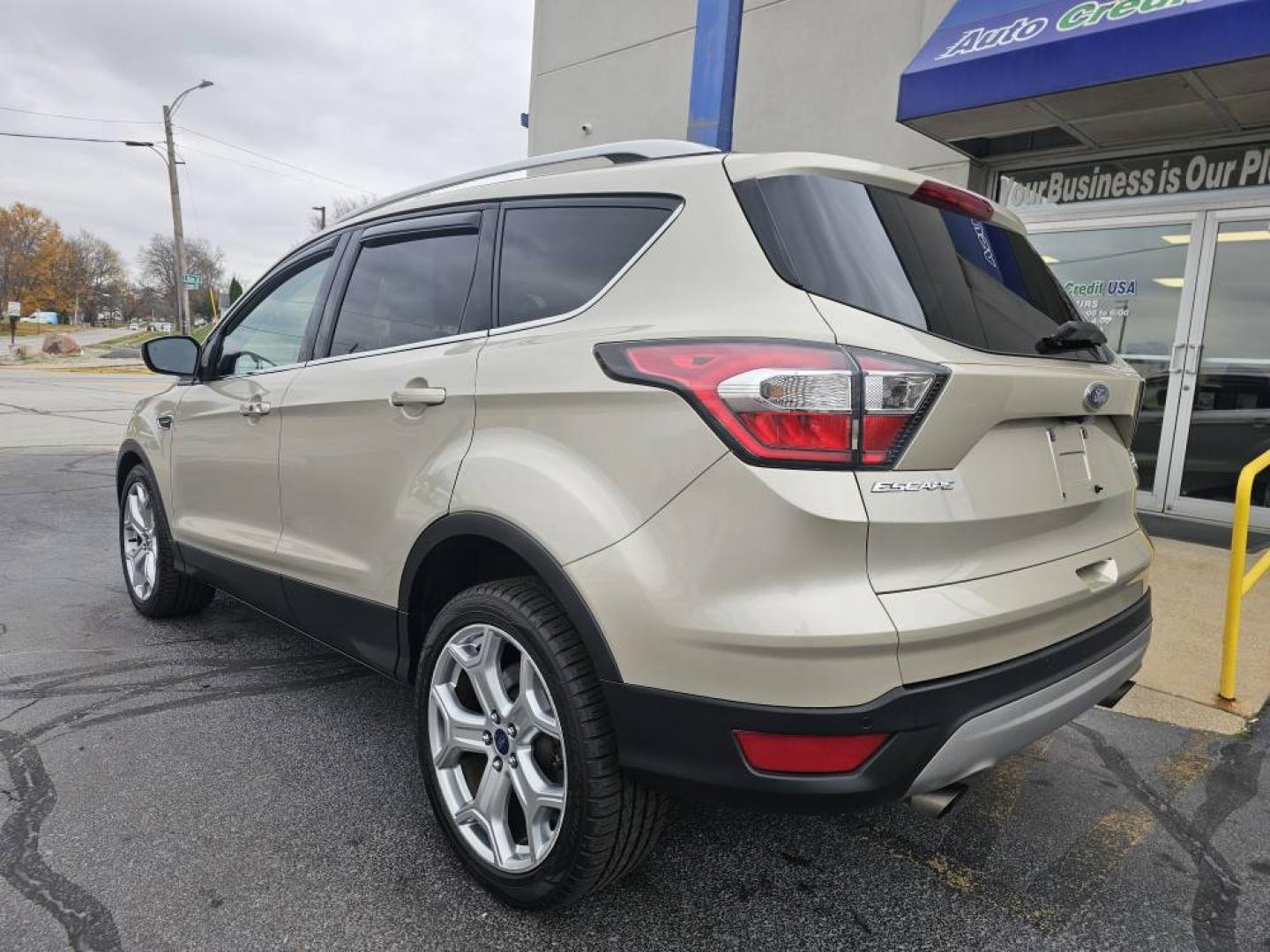 2017 GOLD /Tan FORD ESCAPE TITANIUM Titanium FWD (1FMCU0J90HU) with an 2.0L L4 DOHC 16V engine, 6A transmission, located at 502 South Main Street, Columbia City, IN, 46725, (260) 244-4645, 41.151382, -85.490578 - Photo#3