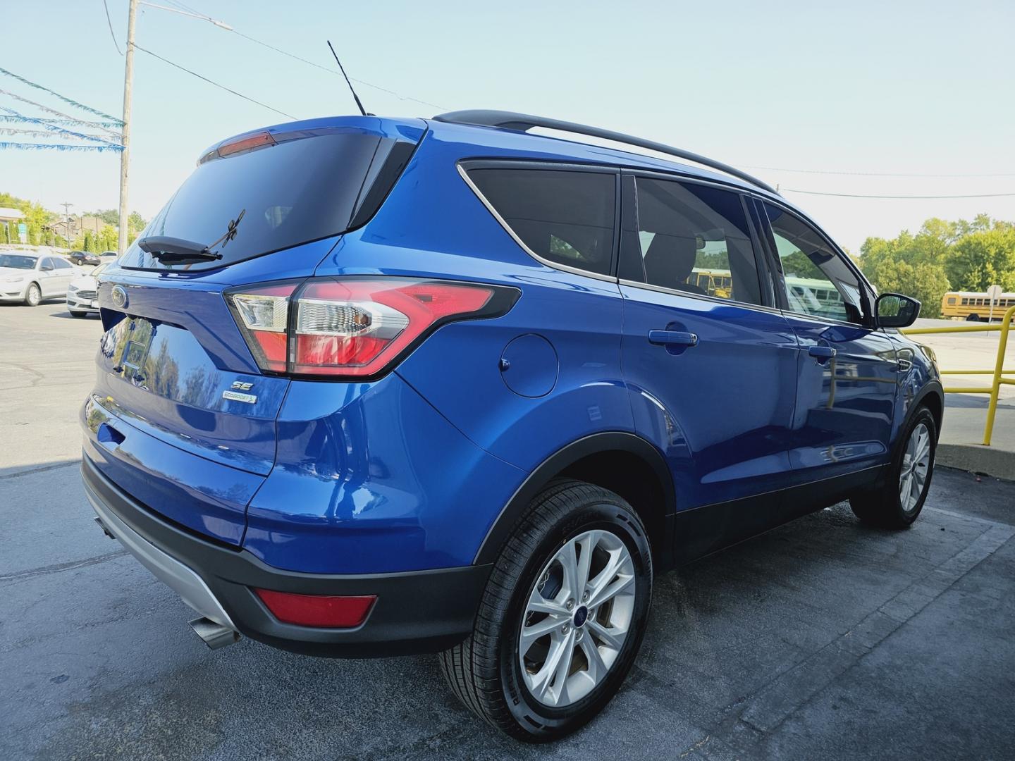 2018 BLUE FORD ESCAPE SE (1FMCU0GD1JU) , located at 502 South Main Street, Columbia City, IN, 46725, (260) 244-4645, 41.151382, -85.490578 - Photo#3