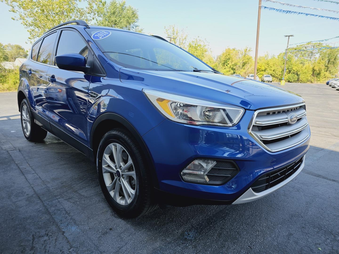 2018 BLUE FORD ESCAPE SE (1FMCU0GD1JU) , located at 502 South Main Street, Columbia City, IN, 46725, (260) 244-4645, 41.151382, -85.490578 - Photo#1