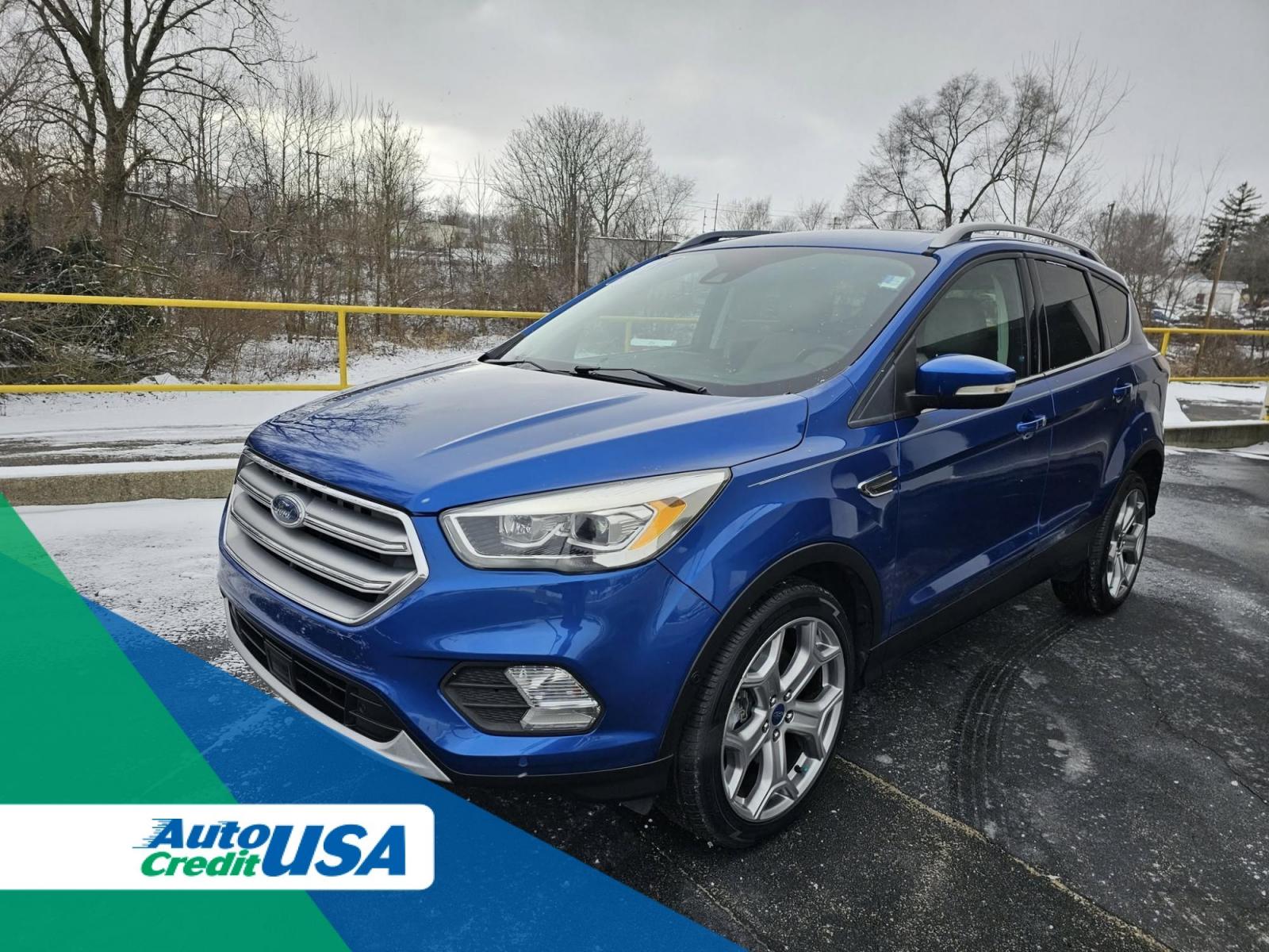 2017 BLUE /BLACK Ford ESCAPE Titanium FWD (1FMCU0J94HU) with an 2.0L L4 DOHC 16V engine, 6A transmission, located at 502 South Main Street, Columbia City, IN, 46725, (260) 244-4645, 41.151382, -85.490578 - 2017 Ford ESCAPE Titanium FWD - Photo#0