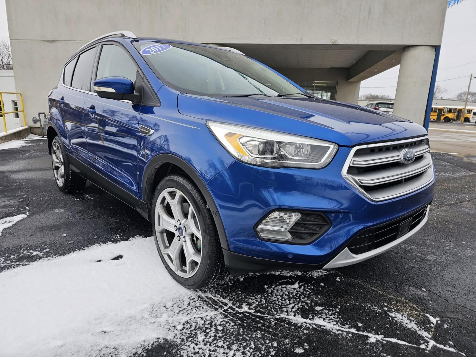 2017 BLUE /BLACK Ford ESCAPE Titanium FWD (1FMCU0J94HU) with an 2.0L L4 DOHC 16V engine, 6A transmission, located at 502 South Main Street, Columbia City, IN, 46725, (260) 244-4645, 41.151382, -85.490578 - 2017 Ford ESCAPE Titanium FWD - Photo#2