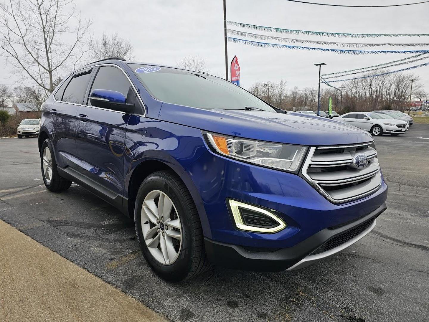 2015 BLUE /BLACK Ford EDGE SEL FWD (2FMTK3J83FB) with an 3.5L V6 DOHC 24V engine, 6-Speed Automatic transmission, located at 502 South Main Street, Columbia City, IN, 46725, (260) 244-4645, 41.151382, -85.490578 - 2015 Ford EDGE SEL FWD - Photo#2