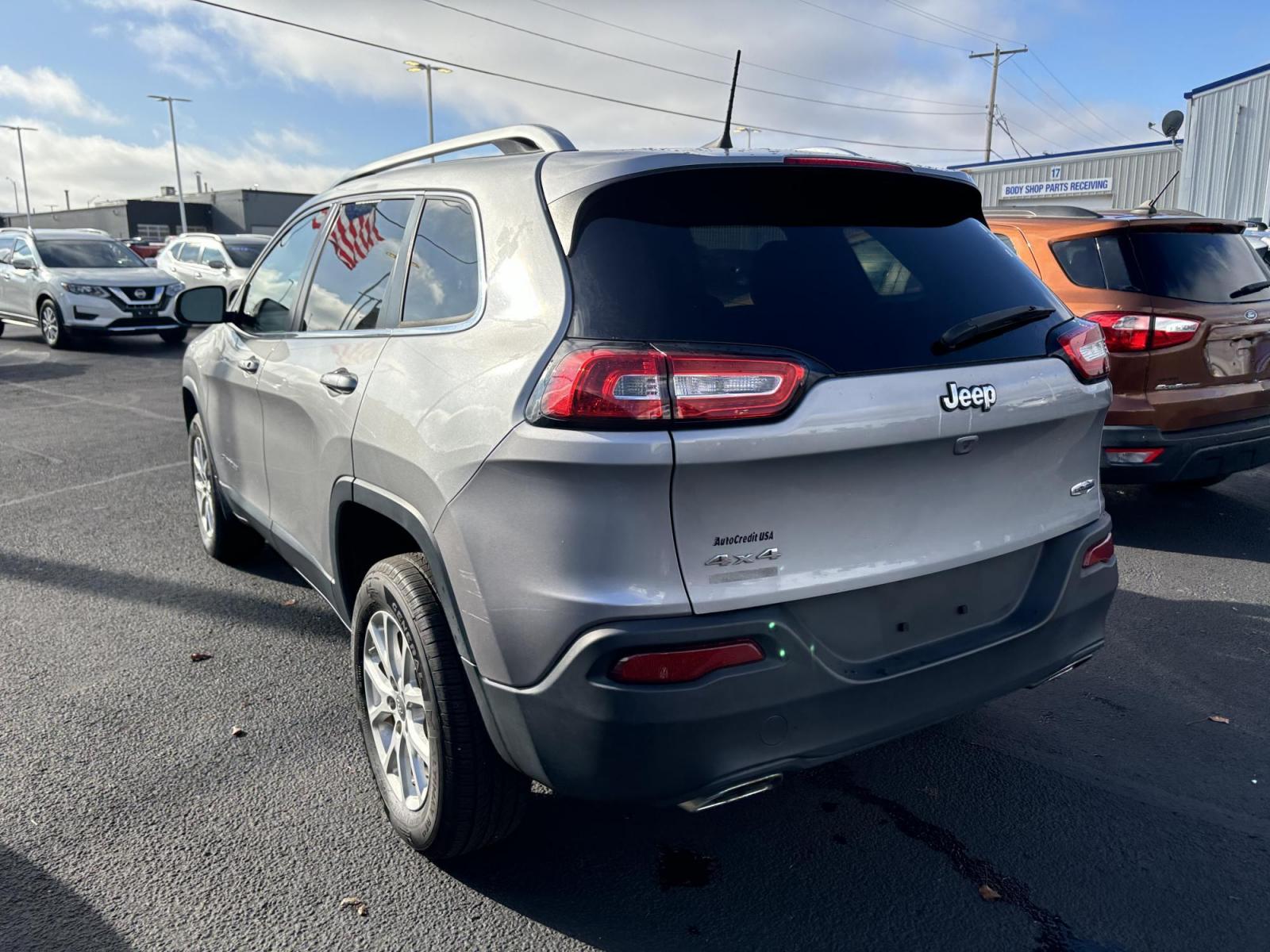 2016 GREY /Black Jeep CHEROKEE LATITUDE Latitude 4WD (1C4PJMCSXGW) with an 3.2L V6 DOHC 24V engine, 9-Speed Automatic transmission, located at 100 West Coliseum Boulevard, Fort Wayne, IN, 46805, (260) 471-0567, 41.119961, -85.140312 - 2016 Jeep CHEROKEE LATITUDE Latitude 4WD - Photo#2