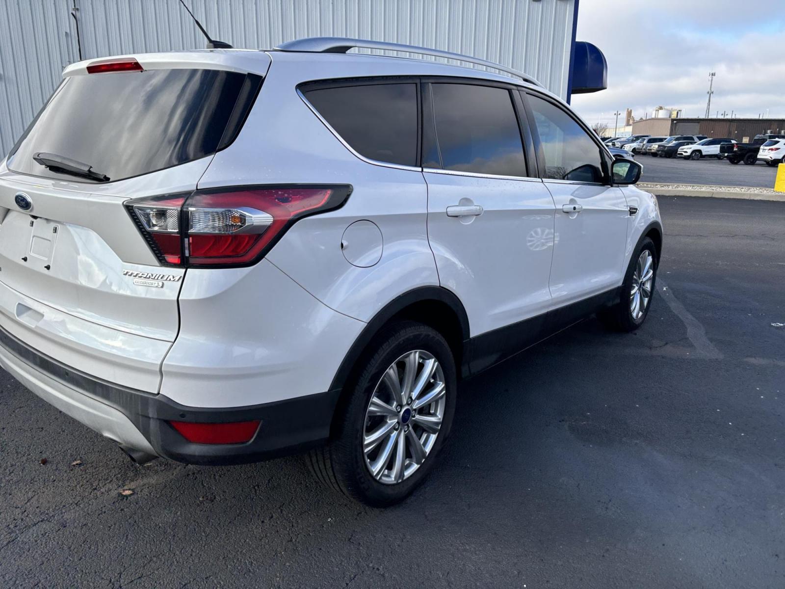 2017 WHITE Ford ESCAPE TITANIUM Titanium FWD (1FMCU0J9XHU) with an 2.0L L4 DOHC 16V engine, 6A transmission, located at 100 West Coliseum Boulevard, Fort Wayne, IN, 46805, (260) 471-0567, 41.119961, -85.140312 - 2017 Ford ESCAPE TITANIUM Titanium FWD - Photo#2