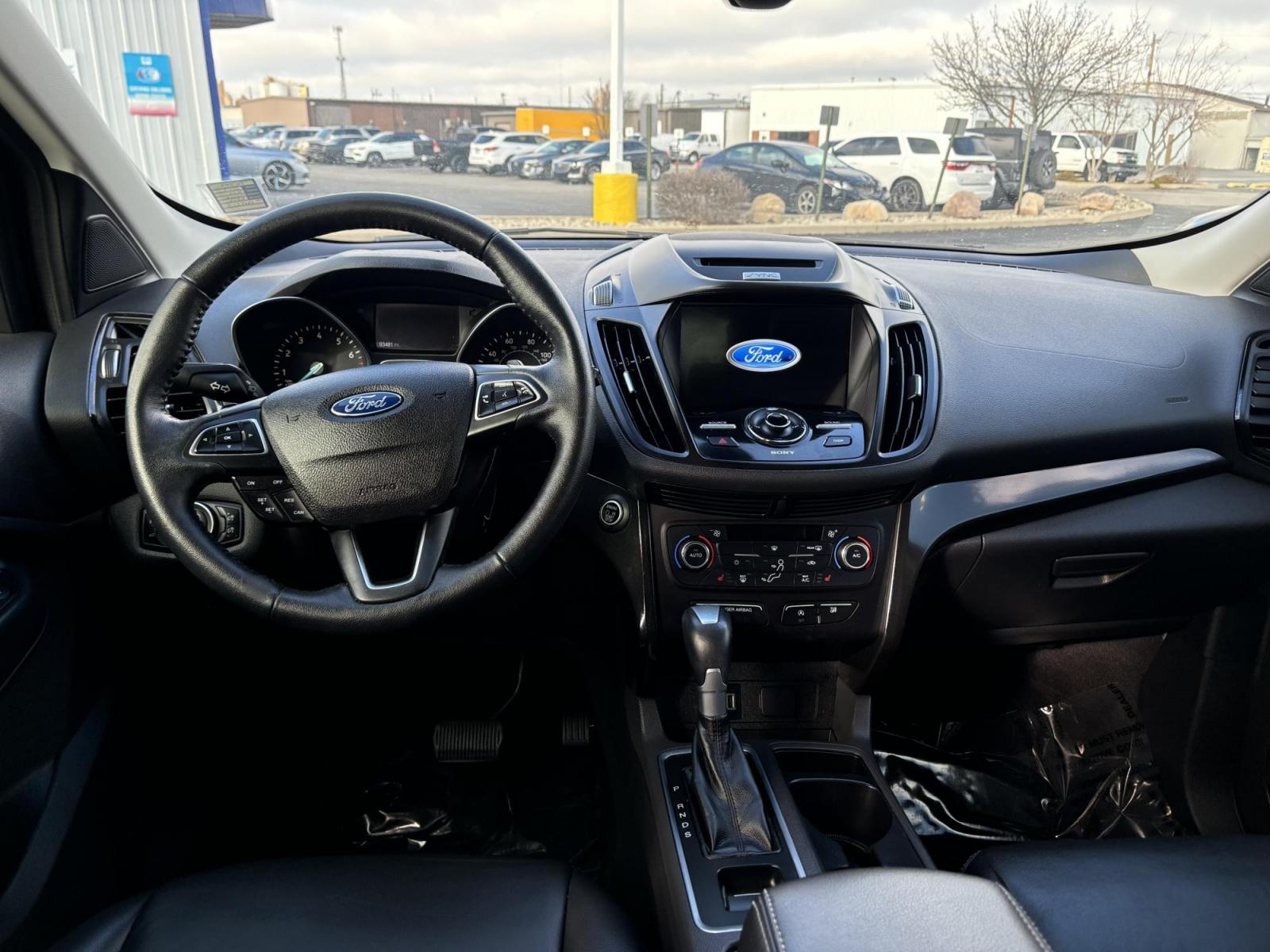 2017 WHITE Ford ESCAPE TITANIUM Titanium FWD (1FMCU0J9XHU) with an 2.0L L4 DOHC 16V engine, 6A transmission, located at 100 West Coliseum Boulevard, Fort Wayne, IN, 46805, (260) 471-0567, 41.119961, -85.140312 - 2017 Ford ESCAPE TITANIUM Titanium FWD - Photo#5