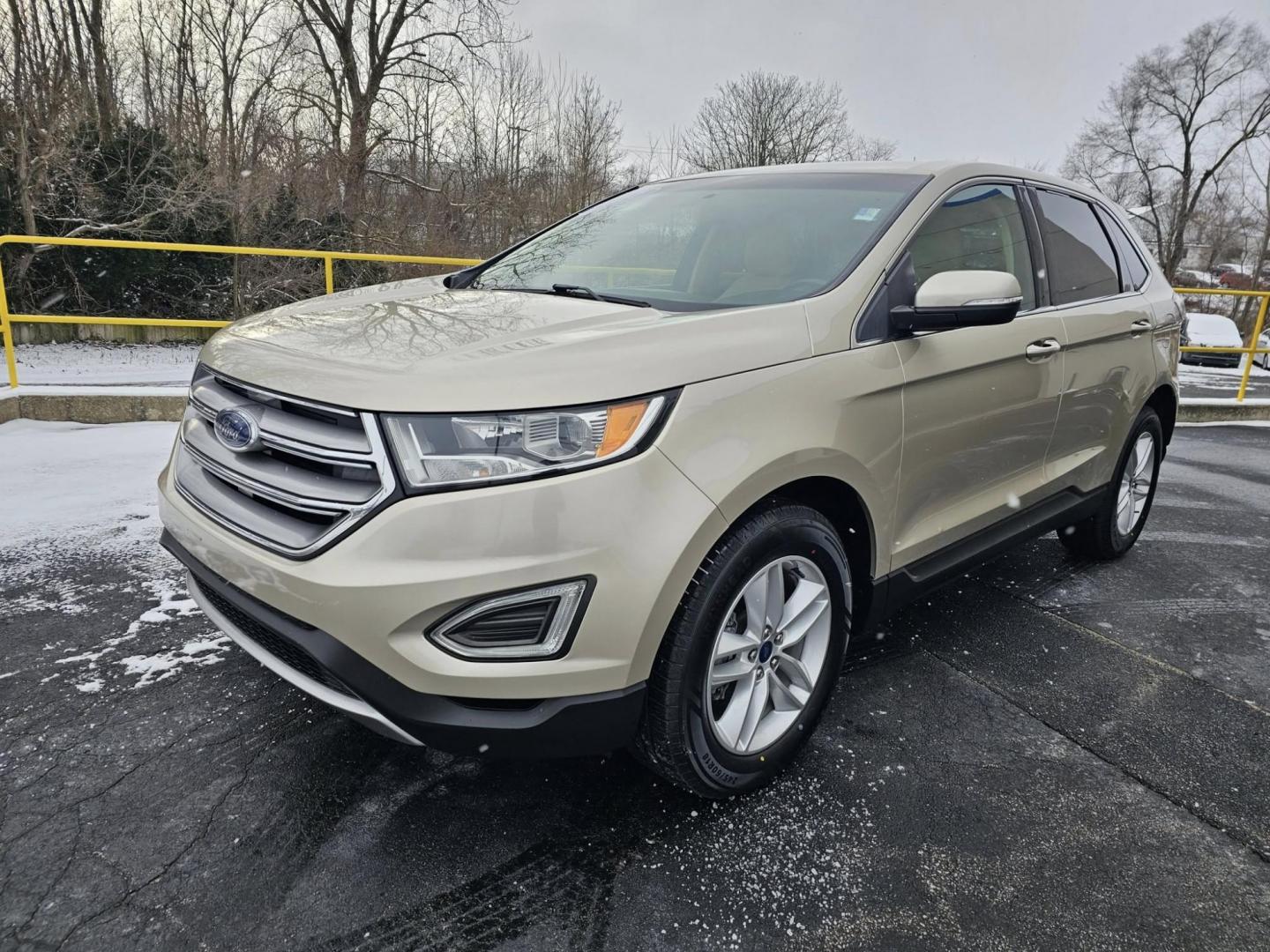 2017 GOLD /TAN Ford EDGE SEL SEL FWD (2FMPK3J96HB) with an 2.0L L4 DOHC 16V engine, 6A transmission, located at 502 South Main Street, Columbia City, IN, 46725, (260) 244-4645, 41.151382, -85.490578 - 2017 Ford EDGE SEL SEL FWD - Photo#1