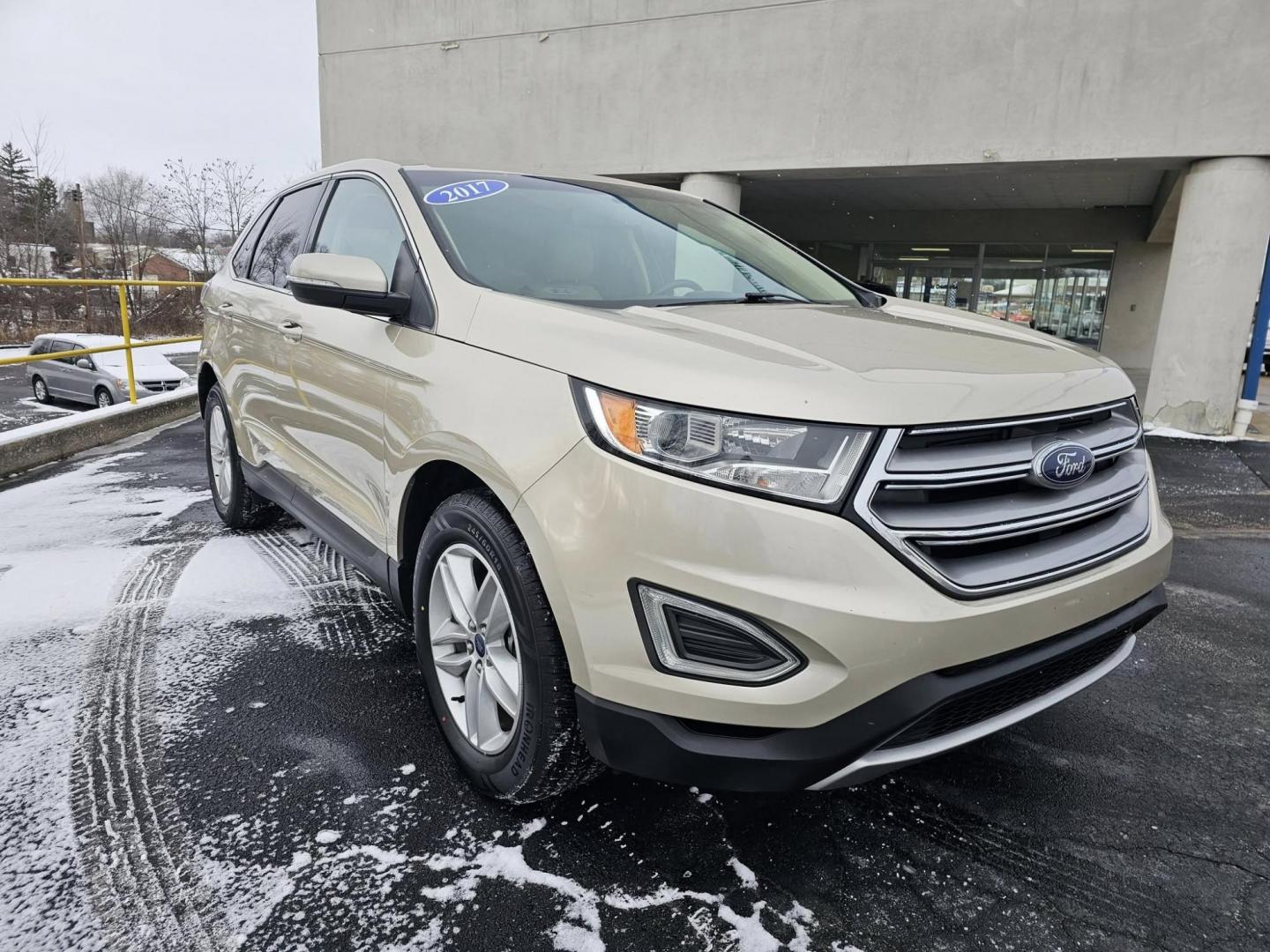 2017 GOLD /TAN Ford Edge SEL FWD (2FMPK3J96HB) with an 2.0L L4 DOHC 16V engine, 6A transmission, located at 502 South Main Street, Columbia City, IN, 46725, (260) 244-4645, 41.151382, -85.490578 - Photo#1