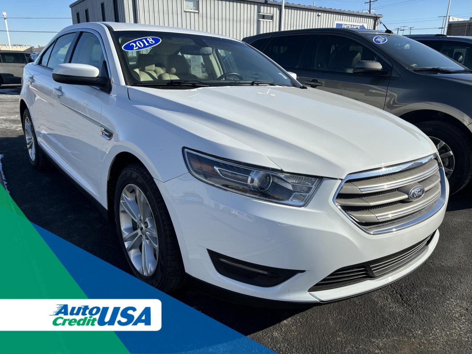 2018 WHITE Ford TAURUS SEL SEL FWD (1FAHP2E80JG) with an 3.5L V6 DOHC 24V engine, 6A transmission, located at 100 West Coliseum Boulevard, Fort Wayne, IN, 46805, (260) 471-0567, 41.119961, -85.140312 - 2018 Ford TAURUS SEL SEL FWD - Photo#0