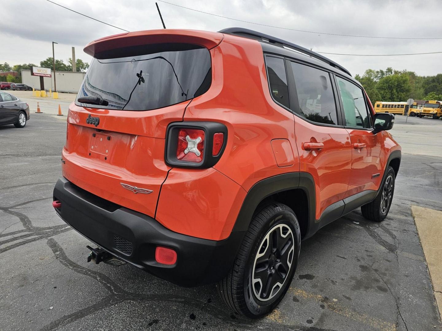 2015 ORANGE JEEP RENEGADE TRAILHAWK (ZACCJBCT9FP) , located at 502 South Main Street, Columbia City, IN, 46725, (260) 244-4645, 41.151382, -85.490578 - Photo#2