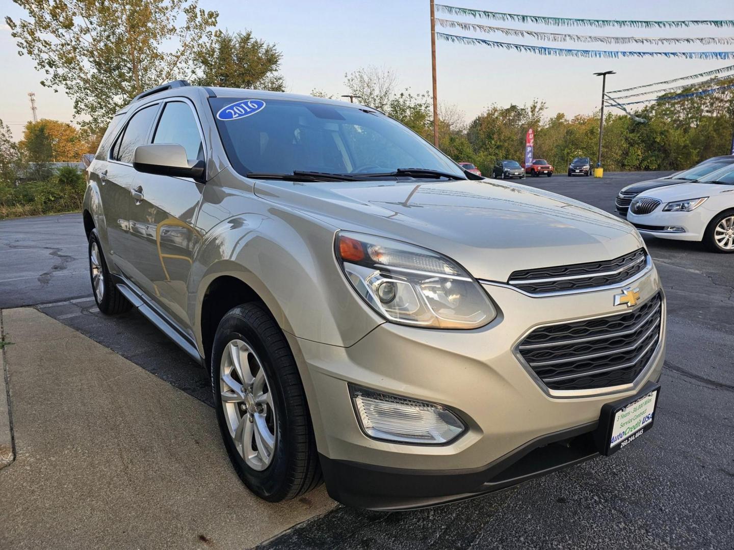 2016 GOLD /BLACK CHEVROLET EQUINOX LT AWD (1GNFLFEK1GZ) with an 2.4L L4 DOHC 16V FFV engine, 6A transmission, located at 502 South Main Street, Columbia City, IN, 46725, (260) 244-4645, 41.151382, -85.490578 - Photo#1