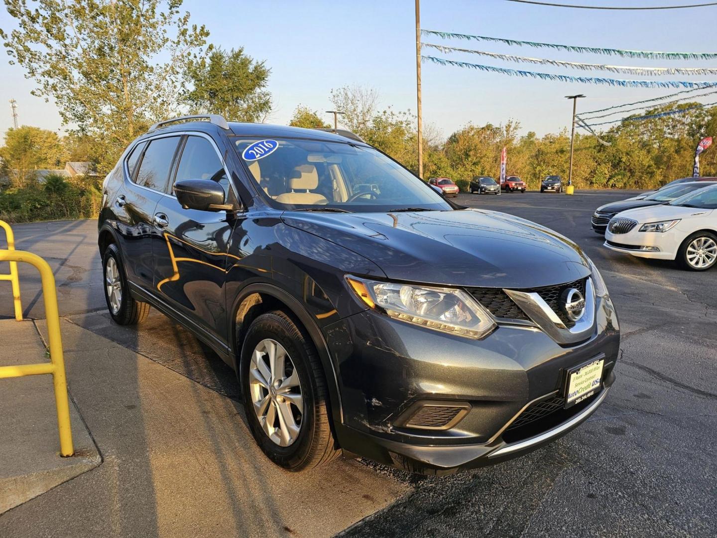 2016 BLUE /TAN NISSAN ROGUE SV AWD (KNMAT2MV9GP) with an 2.5L L4 DOHC 16V engine, CVT transmission, located at 502 South Main Street, Columbia City, IN, 46725, (260) 244-4645, 41.151382, -85.490578 - Photo#1