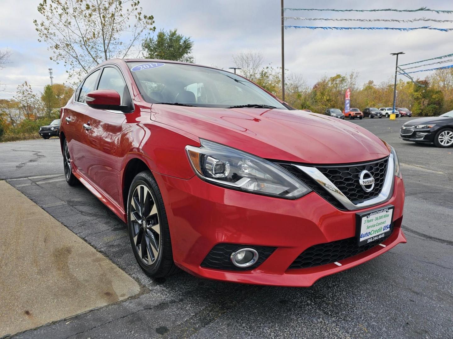 2017 RED /BLACK NISSAN SENTRA SR S 6MT (3N1AB7AP3HY) with an 1.8L L4 SFI DOHC 16V engine, 6M transmission, located at 502 South Main Street, Columbia City, IN, 46725, (260) 244-4645, 41.151382, -85.490578 - 2017 NISSAN SENTRA SR S 6MT - Photo#2