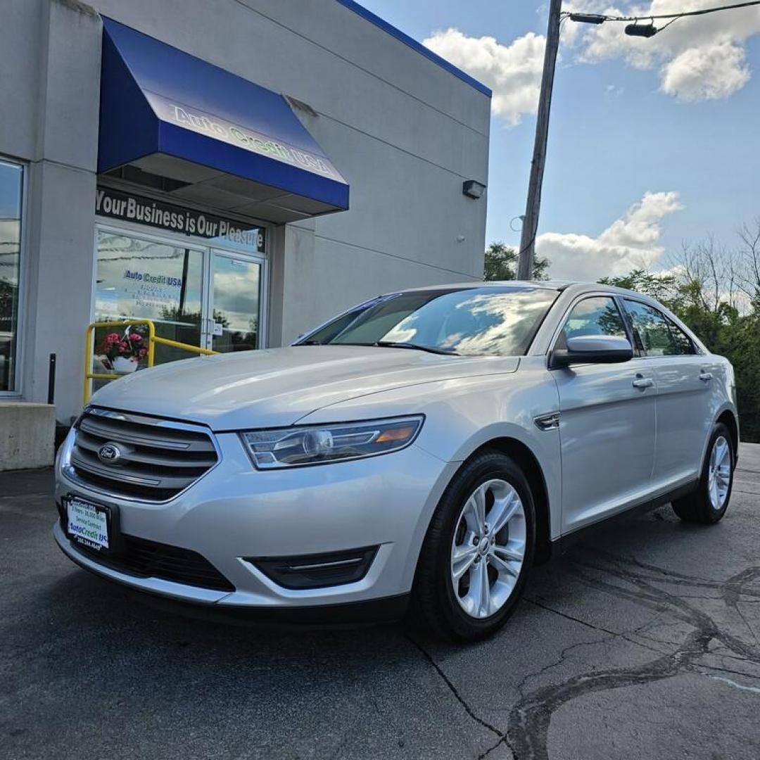 2014 SILVER FORD TAURUS SEL (1FAHP2E85EG) with an 3.5L V-6 engine, 6 speed AT transmission, located at 502 South Main Street, Columbia City, IN, 46725, (260) 244-4645, 41.151382, -85.490578 - Photo#0