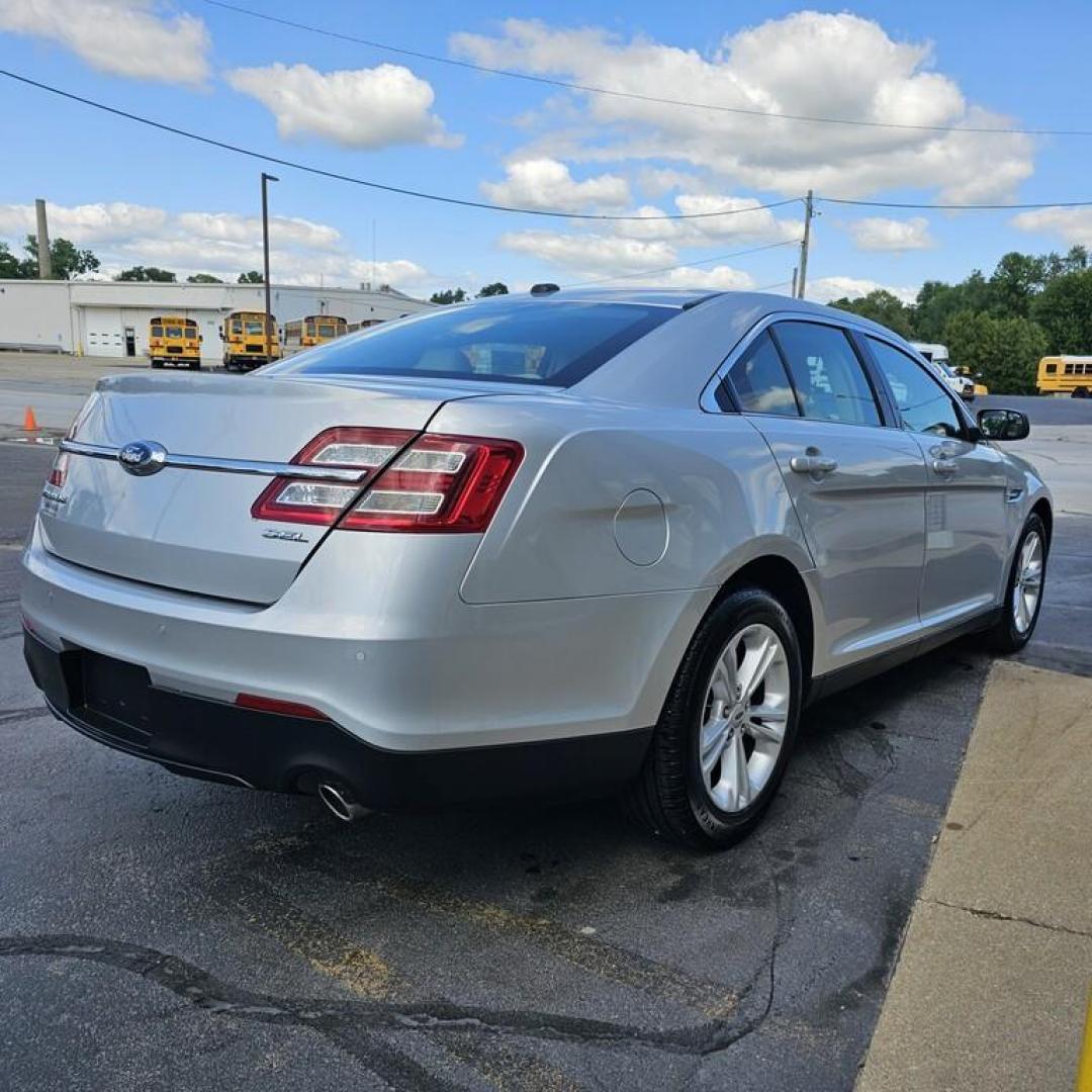 2014 SILVER FORD TAURUS SEL (1FAHP2E85EG) with an 3.5L V-6 engine, 6 speed AT transmission, located at 502 South Main Street, Columbia City, IN, 46725, (260) 244-4645, 41.151382, -85.490578 - Photo#2