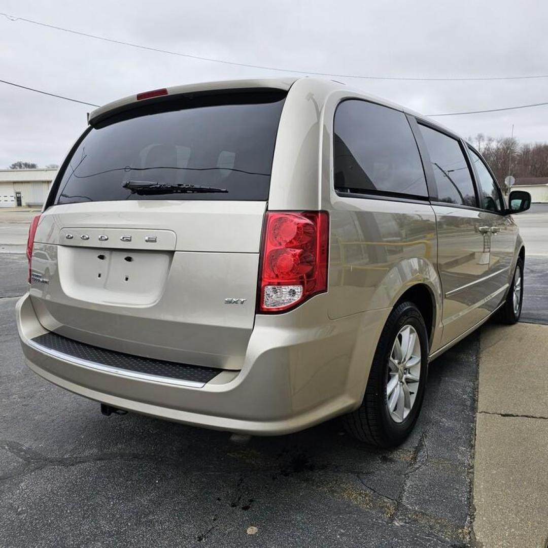 2015 GOLD DODGE GRAND CARAVAN SXT SXT (2C4RDGCG9FR) with an 3.6L V-6 engine, 6 speed AT transmission, located at 502 South Main Street, Columbia City, IN, 46725, (260) 244-4645, 41.151382, -85.490578 - Photo#2