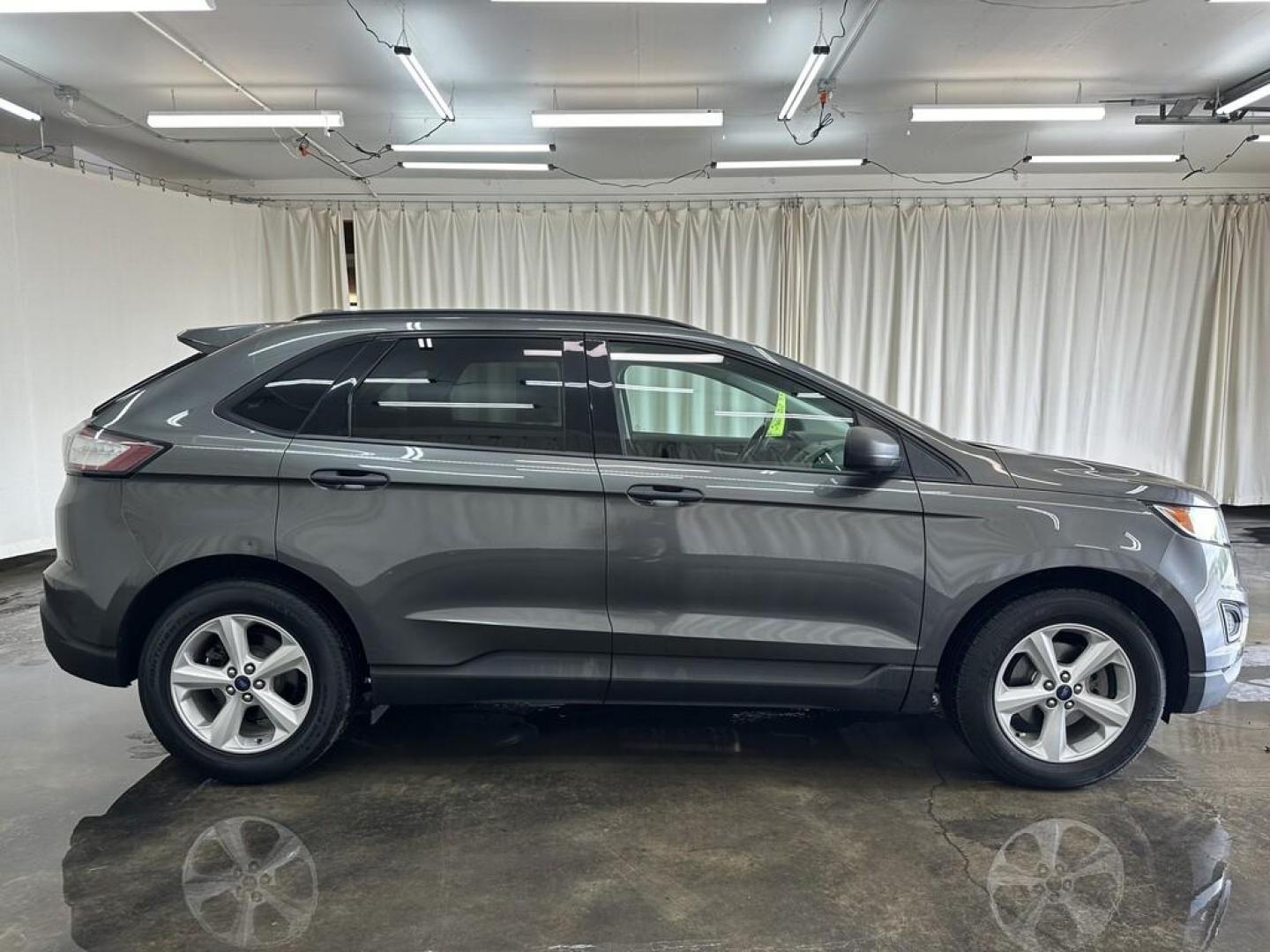 2017 GRAY FORD EDGE SE (2FMPK3G91HB) , located at 15 Petro Dr, Warsaw, IN, 46582, (574) 306-0055, 41.273563, -85.857544 - Photo#2