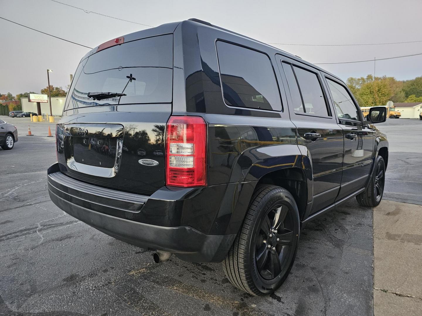 2014 BLACK /Black Jeep Patriot Sport 2WD (1C4NJPBA8ED) with an 2.0L L4 DOHC 16V engine, located at 502 South Main Street, Columbia City, IN, 46725, (260) 244-4645, 41.151382, -85.490578 - Photo#2