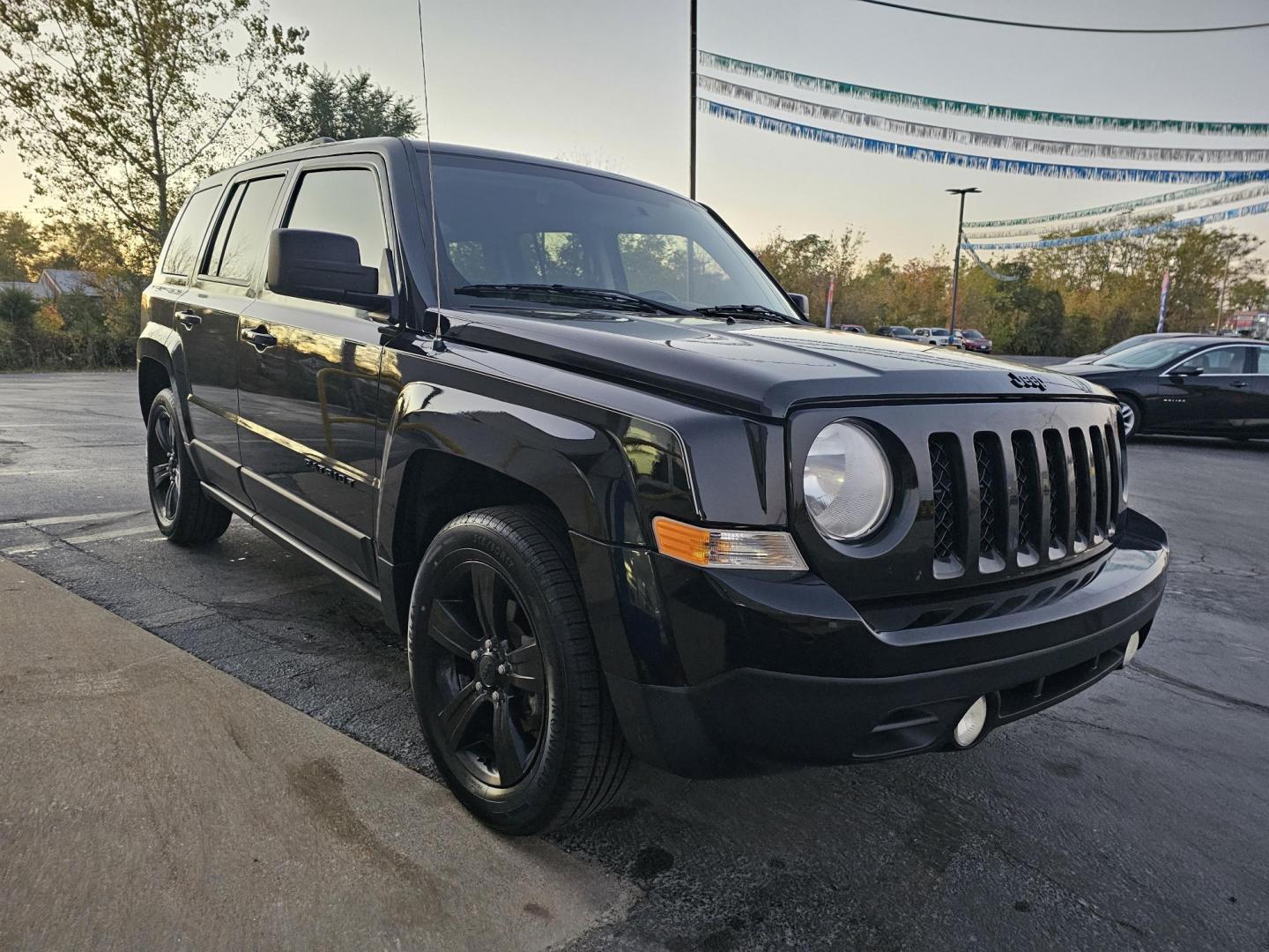 2014 BLACK /Black Jeep Patriot Sport 2WD (1C4NJPBA8ED) with an 2.0L L4 DOHC 16V engine, located at 502 South Main Street, Columbia City, IN, 46725, (260) 244-4645, 41.151382, -85.490578 - Photo#1