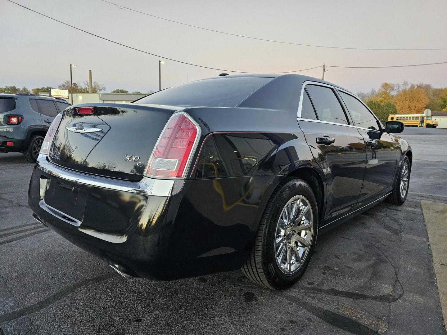 2014 BLACK /TAN CHRYSLER 300C C RWD (2C3CCAEGXEH) with an 3.6L V6 SOHC 24V engine, 5-Speed Automatic transmission, located at 502 South Main Street, Columbia City, IN, 46725, (260) 244-4645, 41.151382, -85.490578 - Photo#2