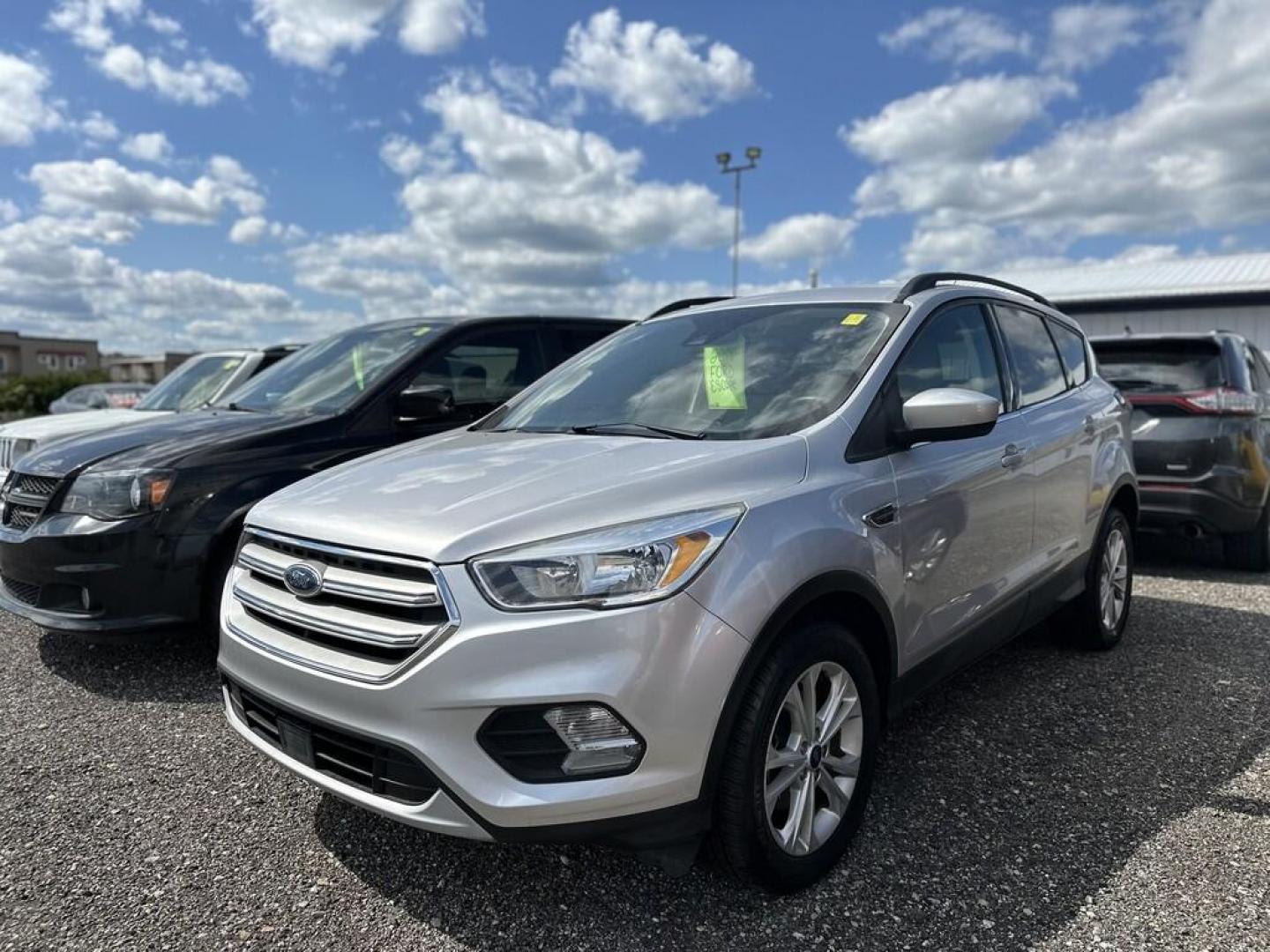 2018 SILVER FORD ESCAPE SE (1FMCU0GD0JU) , located at 15 Petro Dr, Warsaw, IN, 46582, (574) 306-0055, 41.273563, -85.857544 - Photo#0