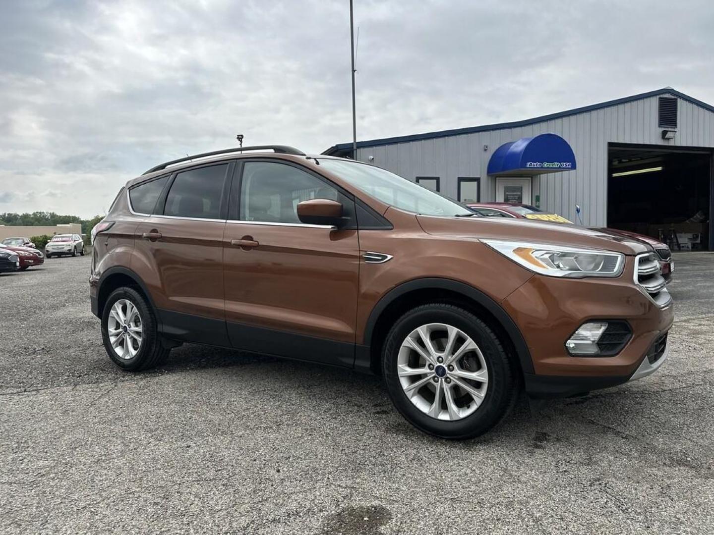 2017 COPPER Ford ESCAPE SE (1FMCU0GDXHU) , located at 15 Petro Dr, Warsaw, IN, 46582, (574) 306-0055, 41.273563, -85.857544 - Photo#1